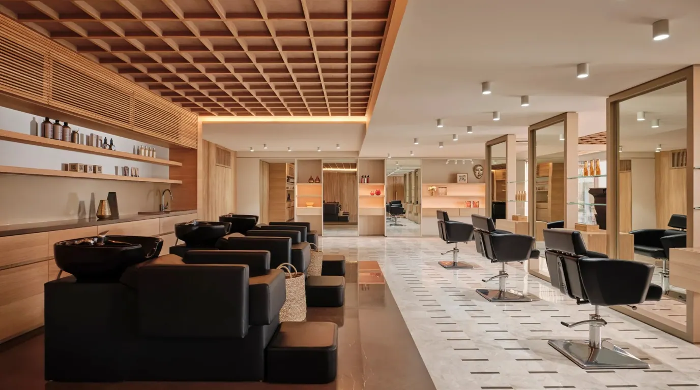 KSHITIJ salon floor with styling stations and retail displays