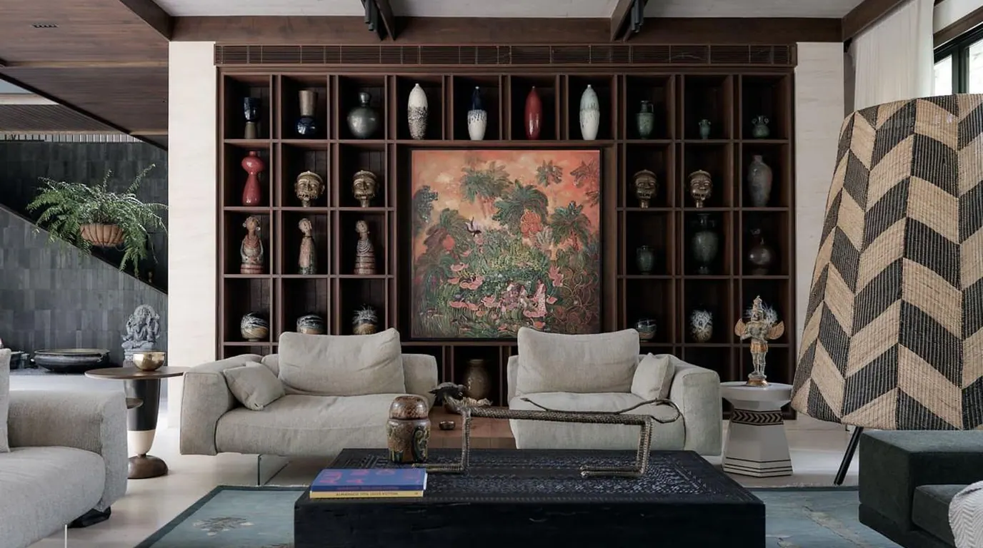 SHANTI library wall with collected objects and artwork